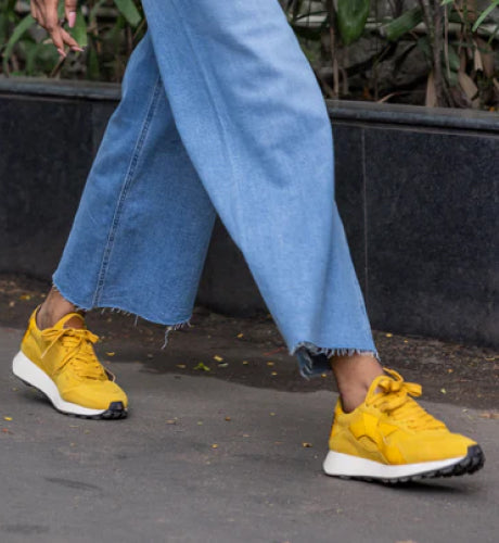 Give Your Heels Some TLC; Wear Trainers With Arch Support