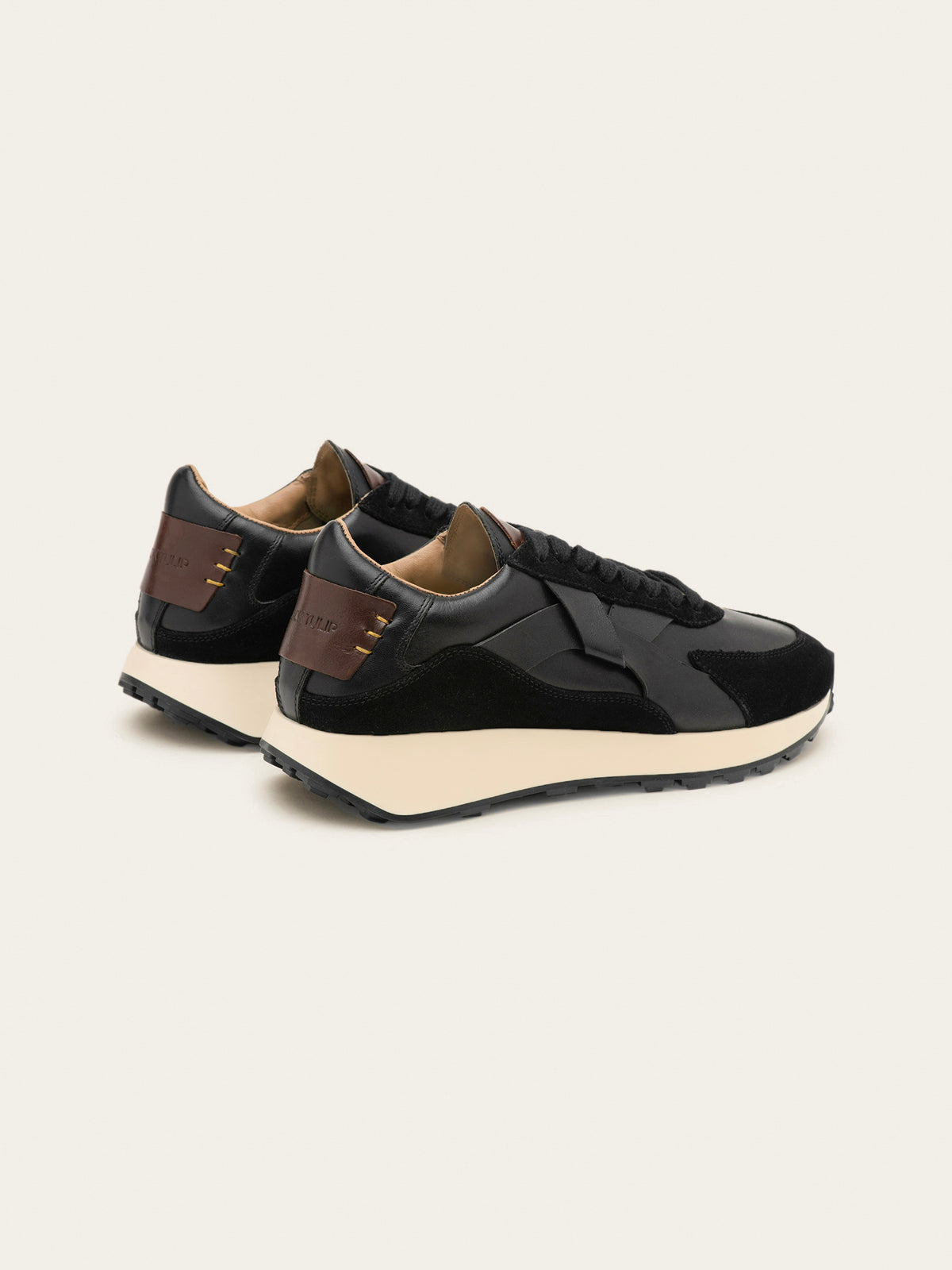 Black Tulip Arbi Sleek Sneaker in Black Leather — women's leather trainers, toe and lacing detail