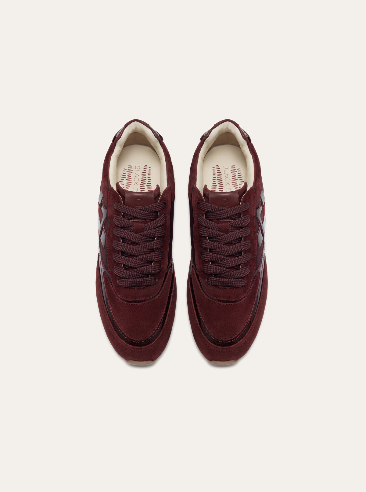 Black Tulip Willow All Day Trainers in Bordeaux — women's leather trainers, three-quarter view