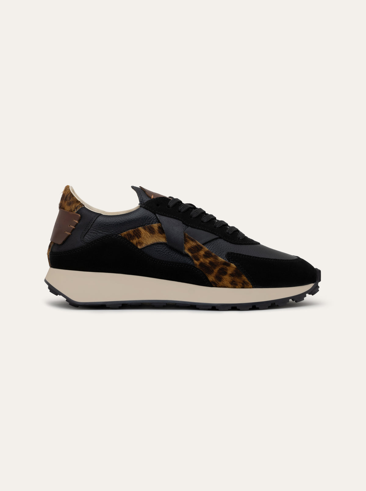 Black Tulip Arbi Sleek Sneaker in Leopard β women's leather trainers, heel and counter detail