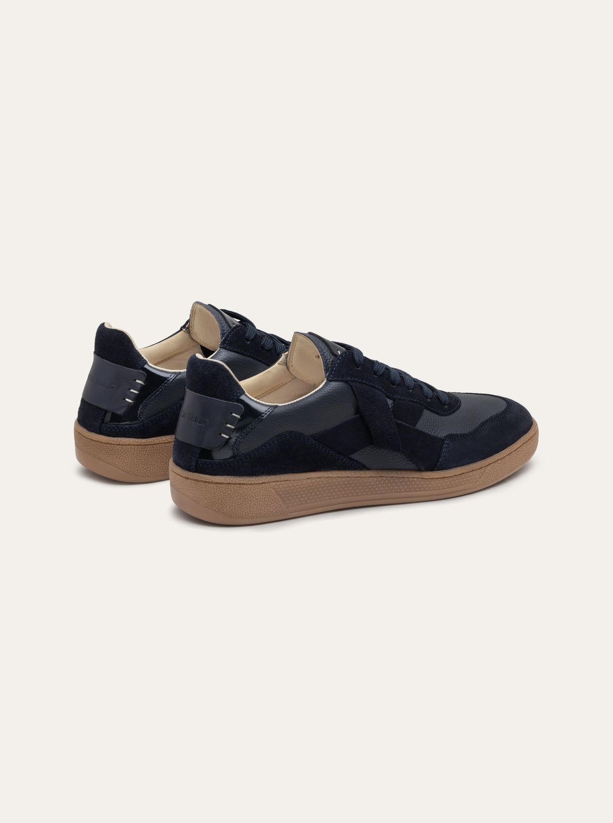 Black Tulip Cassava Classic Tennis Trainer in Navy β women's leather tennis trainers, toe and lacing detail