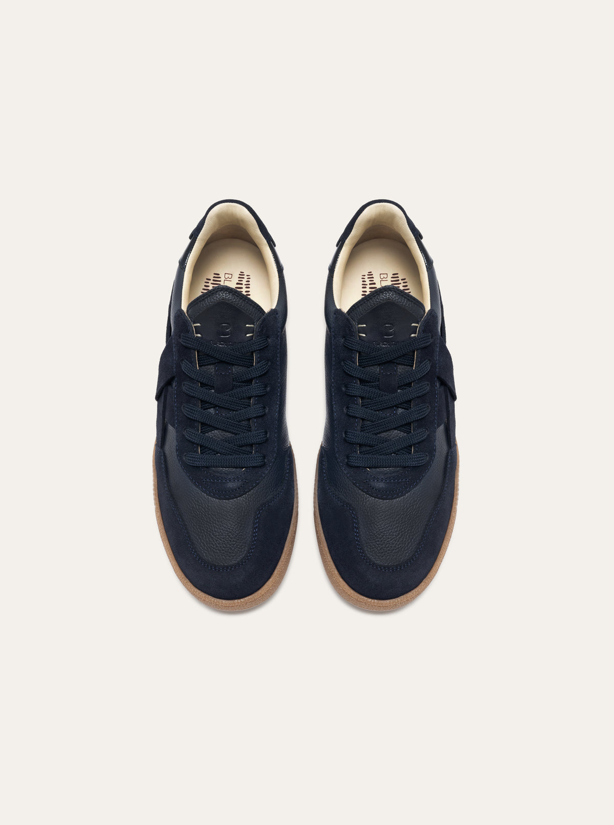 Black Tulip Cassava Classic Tennis Trainer in Navy β women's leather tennis trainers, three-quarter view