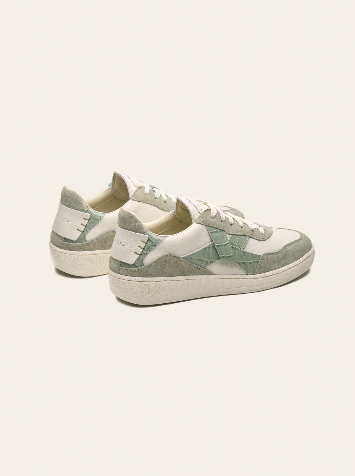 Black Tulip Cassava Classic Tennis Trainer in Sage Green β women's leather tennis trainers, toe and lacing detail