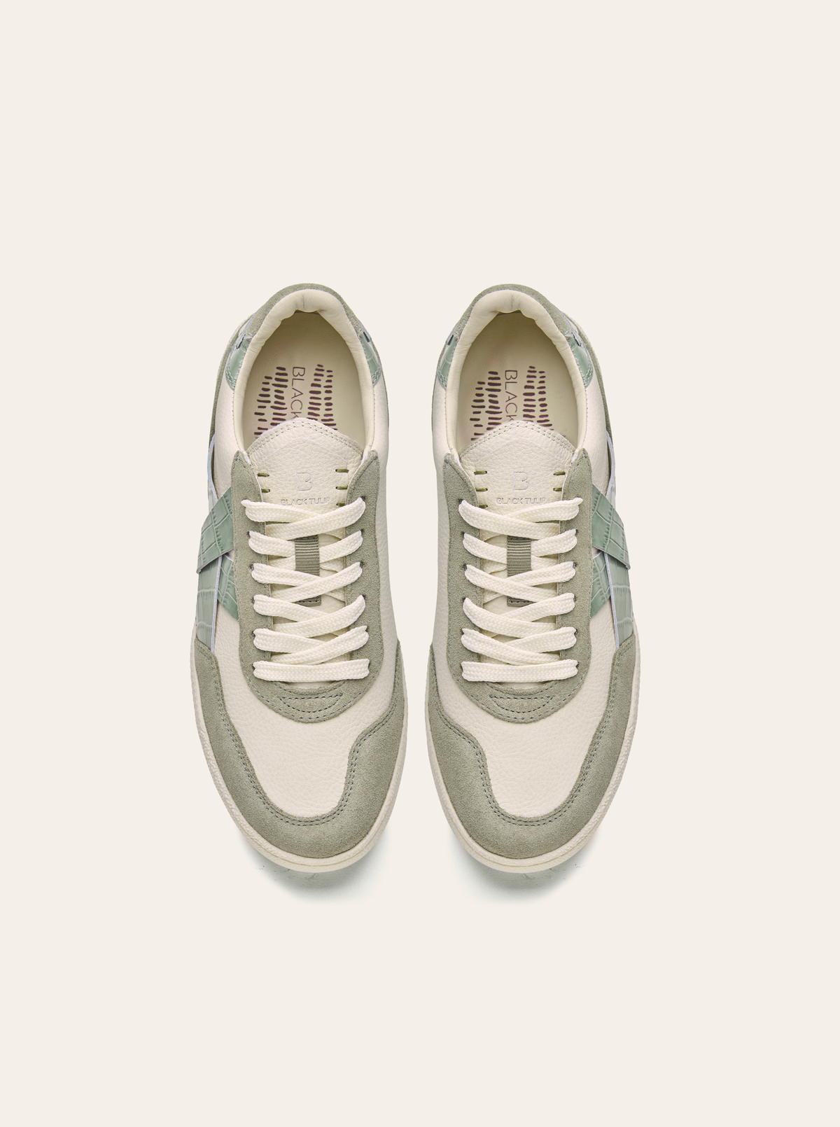 Black Tulip Cassava Classic Tennis Trainer in Sage Green β women's leather tennis trainers, three-quarter view