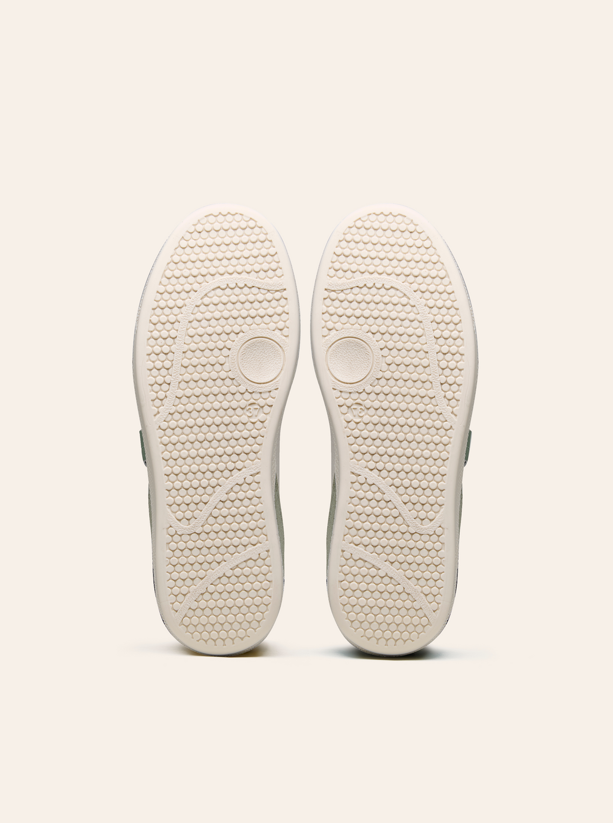 Black Tulip Cassava Classic Tennis Trainer in Sage Green β women's leather tennis trainers, styled on-foot
