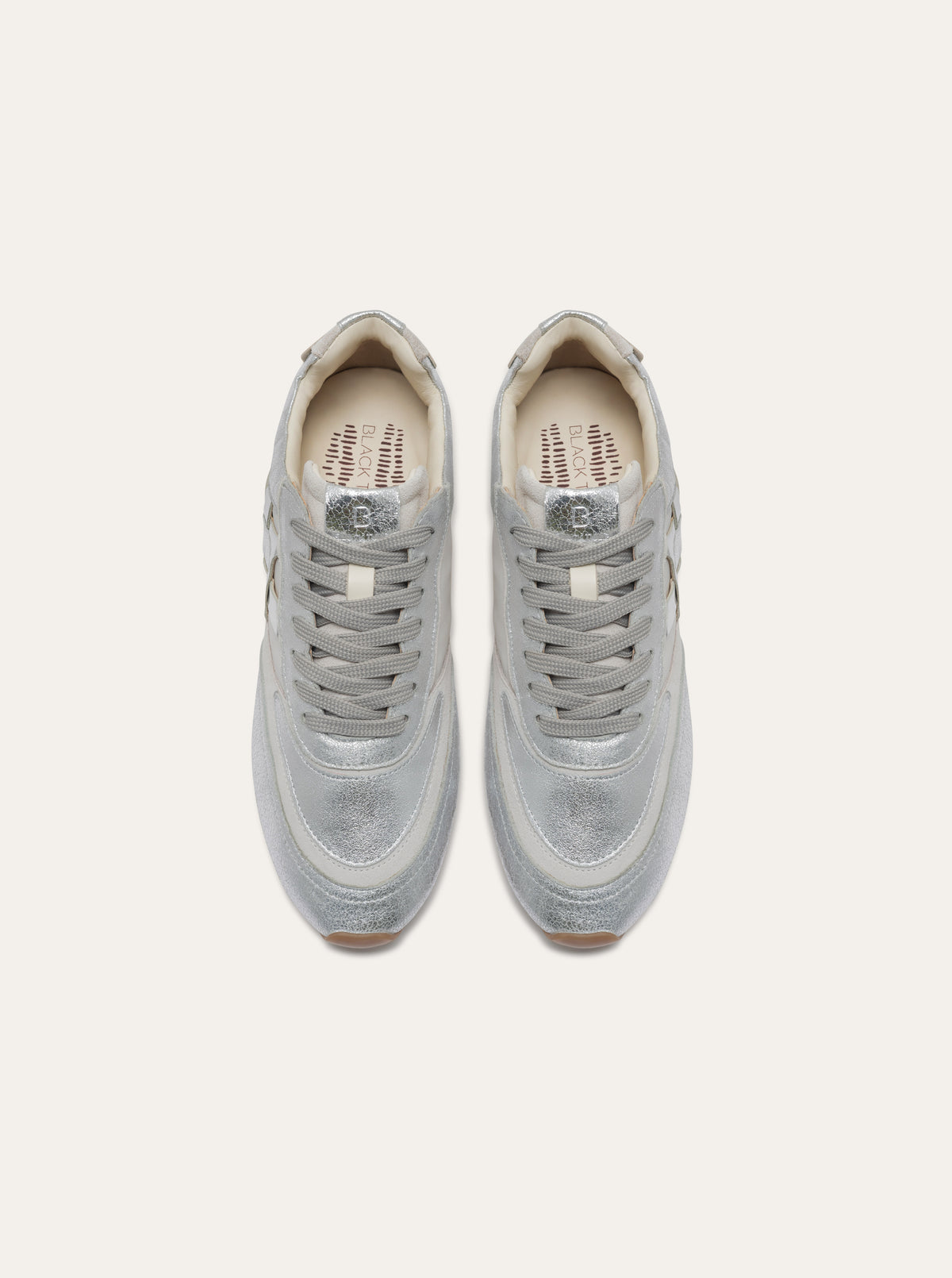 Black Tulip Willow All Day Trainers in Silver β women's leather trainers, three-quarter view